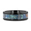 Flat lay of black ceramic ring highlighting polished chrysocolla inlay band, 8mm