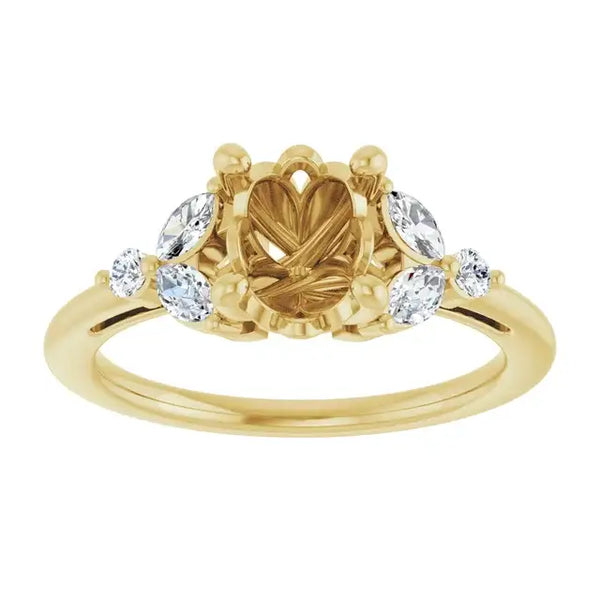 Yellow gold engagement ring setting with oval center stone holder and four round side stones.