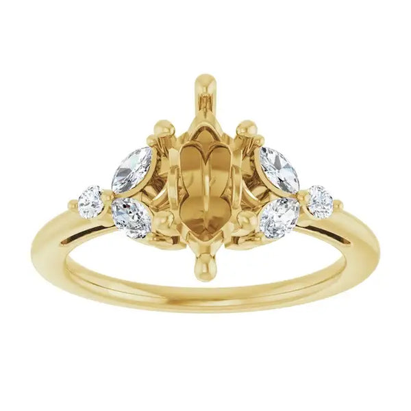 Yellow gold engagement ring setting with marquise-shaped center stone and round accent stones on band.