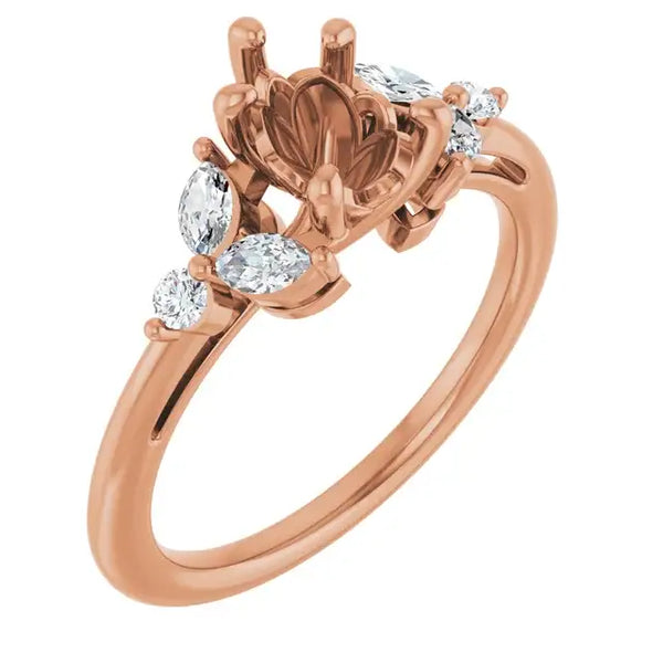 Rose gold engagement ring setting with pear-shaped center stone and round accent diamonds on both sides.
