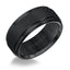 Angled view of black tungsten ring with raised satin center and polished step edges, engraved TRITON inside