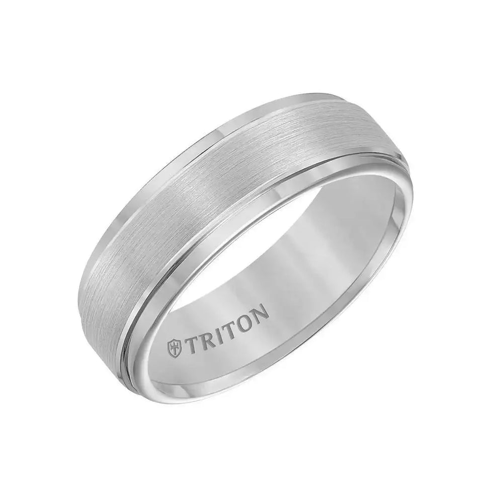 Angle view of EDWIN 7 mm tungsten carbide comfort fit ring with raised brushed center and polished step edges by Triton