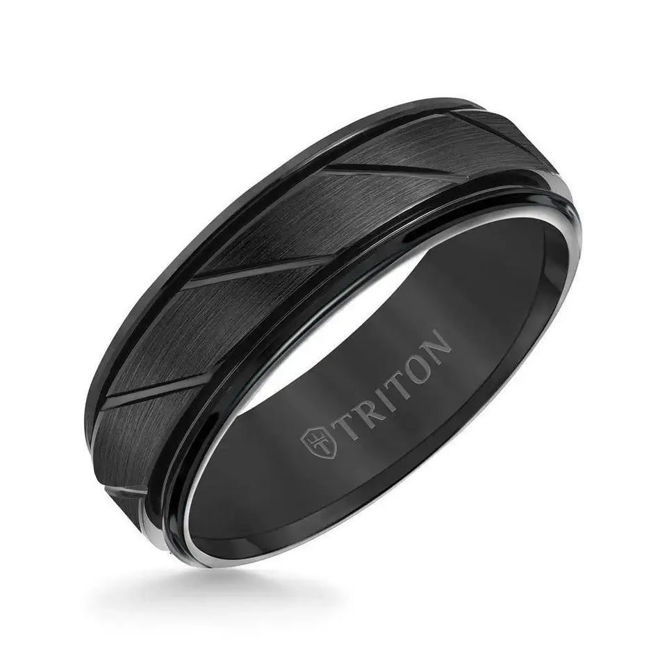 Angled view of a black Triton tungsten wedding band with satin-finished center and diagonal groove cuts, 7mm width