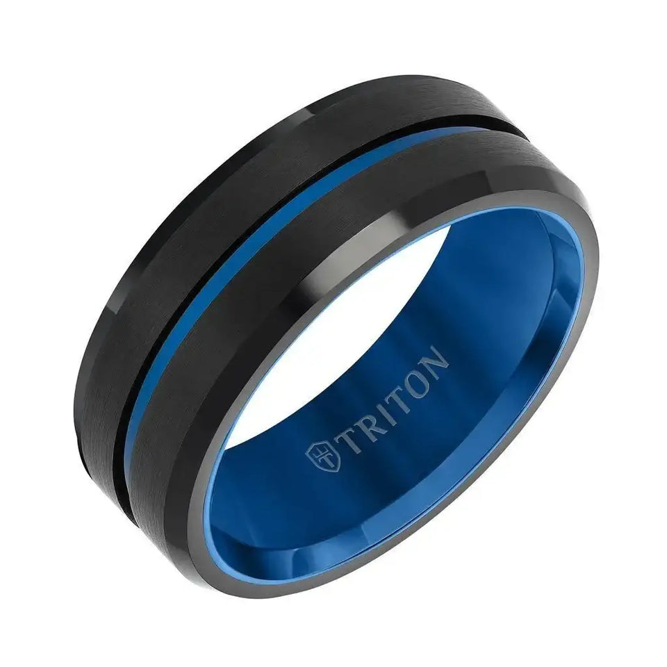 Angled view of an 8mm black tungsten carbide ring with a brushed satin center, blue interior, and a blue center line; inner band reads TRITON