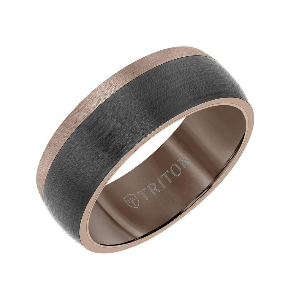 Angled view of an 8mm color-blocked tungsten carbide ring with brushed black center band and rose-gold-tone edges, dome profile, interior engraved with TRITON