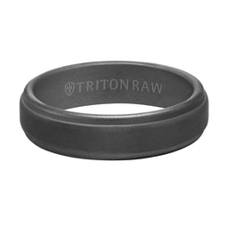 Flat lay of the same 6mm sandblasted step-edge ring showing the TRITON RAW interior engraving