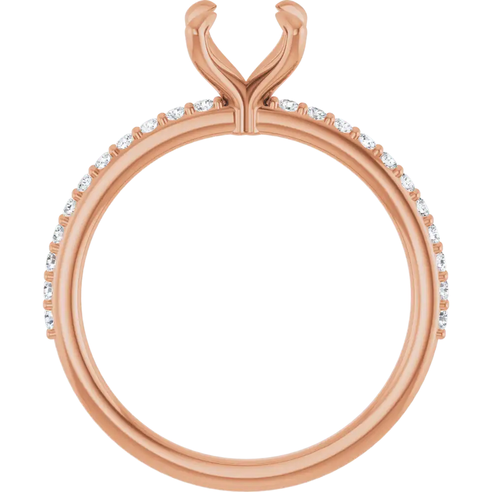 Rose gold engagement ring setting with split prongs, diamond accents along the band, and empty center stone seat.