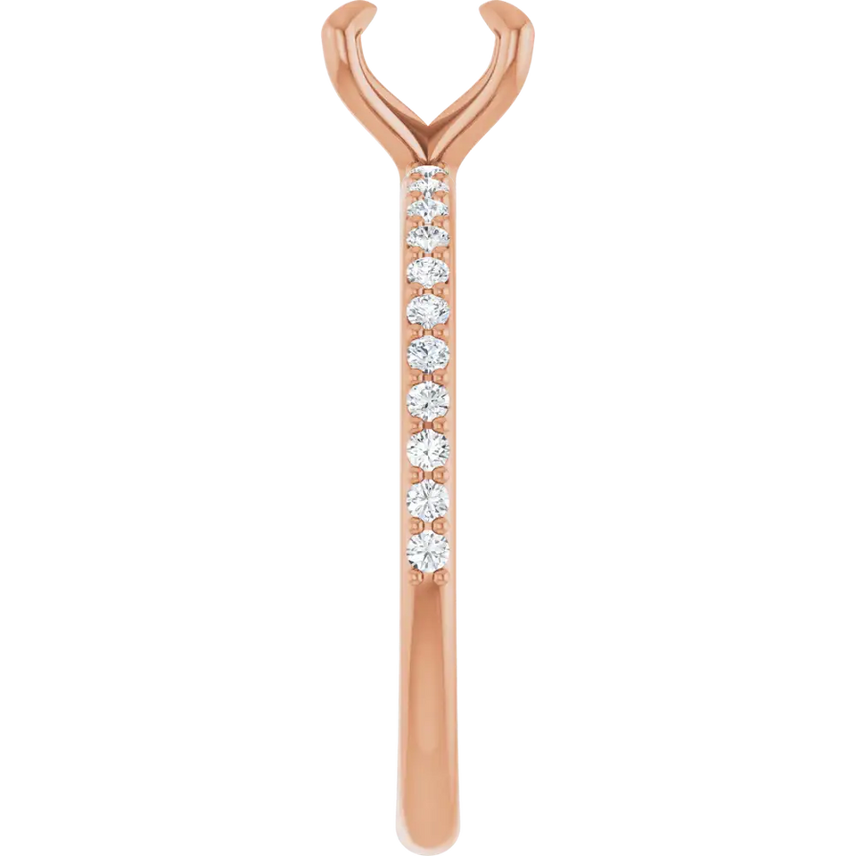 Rose gold engagement ring setting with V-shaped prongs at top and round diamond accents along the shank.