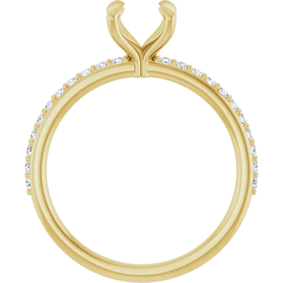 Yellow gold engagement ring setting with V-shaped prongs and diamond accent stones along the band.