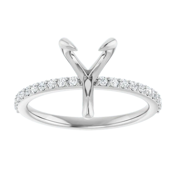 White gold engagement ring setting with V-shaped prongs for pear stone and diamond-accented band.