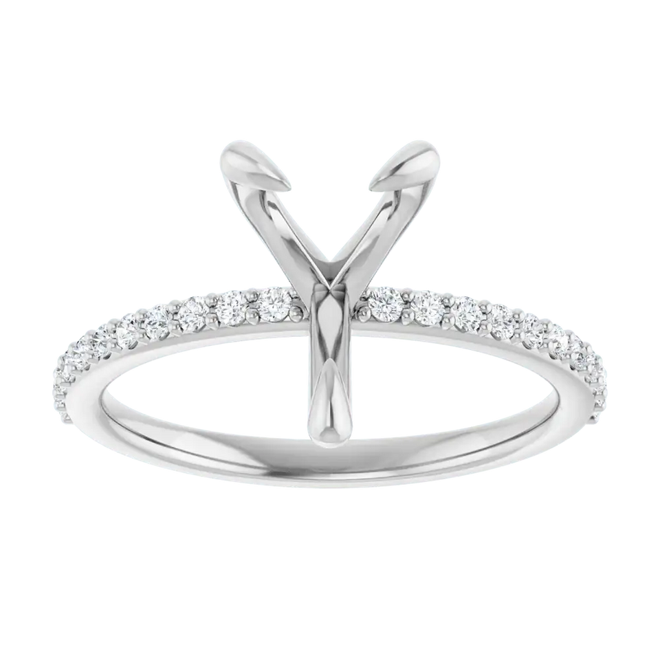 White gold engagement ring setting with V-shaped prongs for pear stone and diamond-accented band.