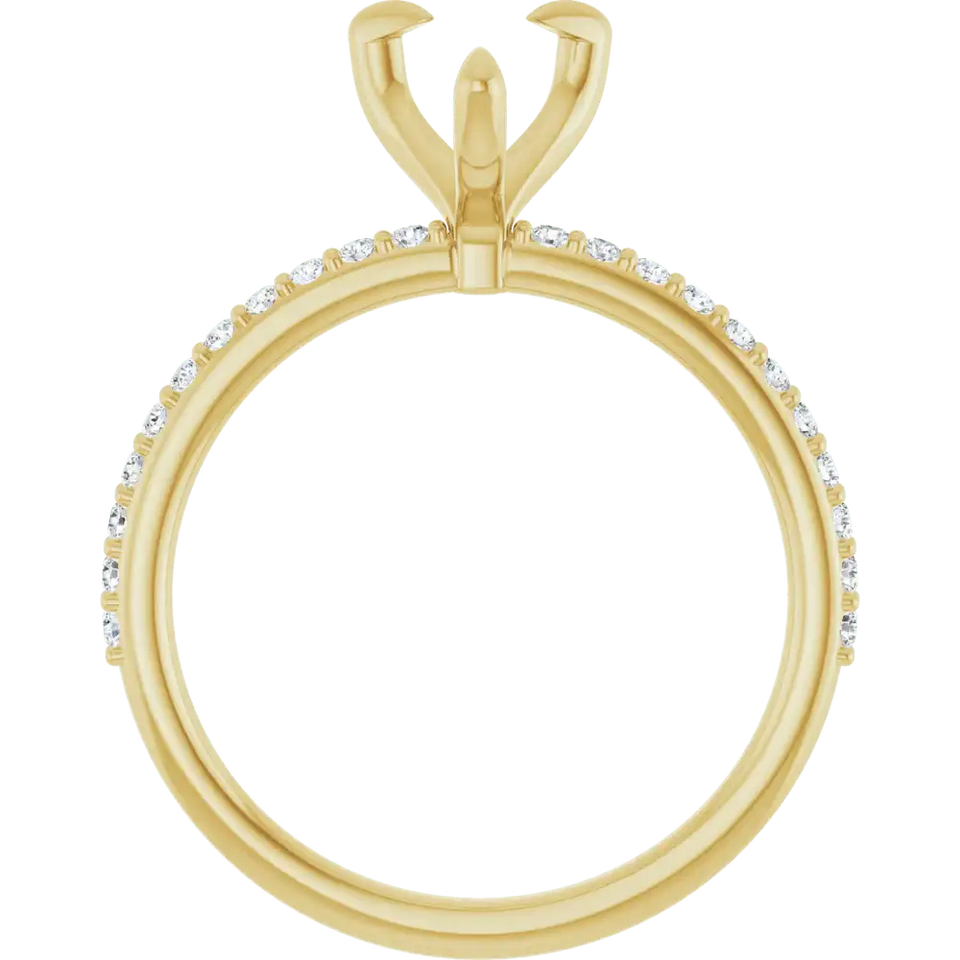 Yellow gold engagement ring setting with pear-shaped stone holder and round diamonds along the band.