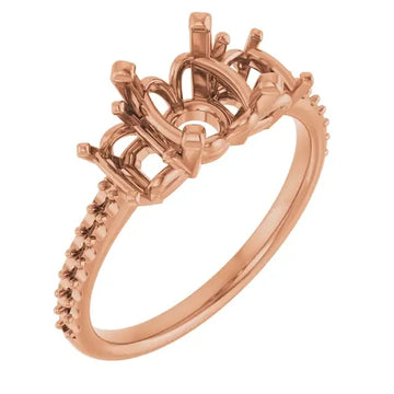 Rose gold ornate engagement ring setting with decorative crown-style head and textured band for round stone.