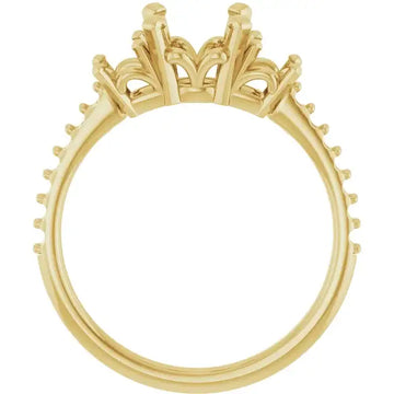 Gold engagement ring setting with ornate crown-style head and empty center for round stone.