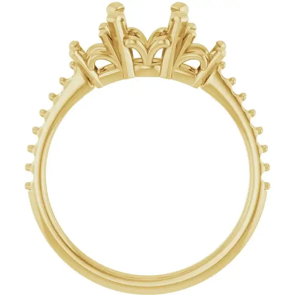 Gold engagement ring setting with ornate crown-style head and empty center for round stone.