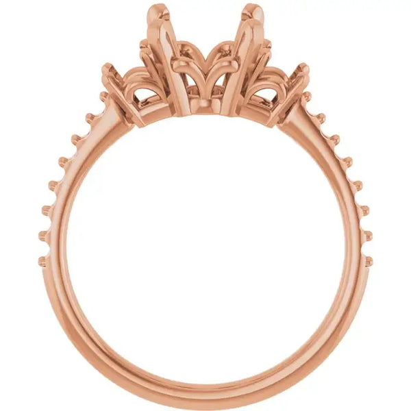 Rose gold engagement ring setting with ornate scrollwork crown and empty oval stone center.
