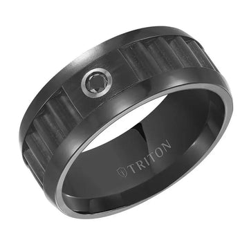 Angle view of 9mm black tungsten carbide men’s wedding band with corrugated center, polished rims, and a single bezel-set black diamond; interior engraved with TRITON