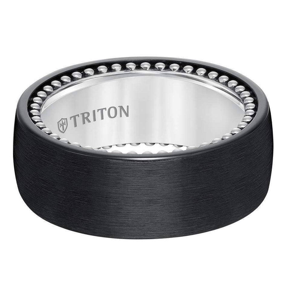 Rear angled view of domed black titanium and sterling silver comfort-fit band highlighting beaded interior edge