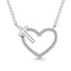 10K White Gold Diamond 1/10 Ct.Tw. Heart and Cross Pendant - Larson Jewelers
