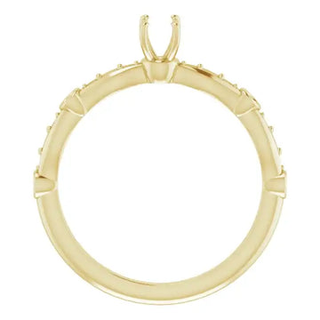 Yellow gold engagement ring setting with prong head and diamond accents along the band.