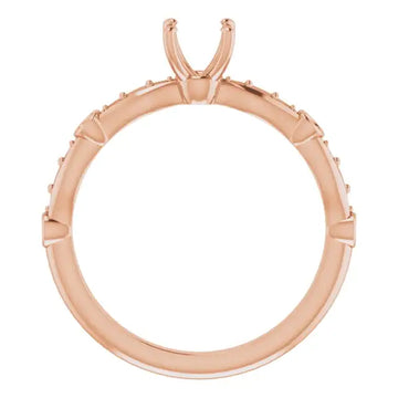 Rose gold engagement ring setting with square stone prongs and small diamond accents along the band.