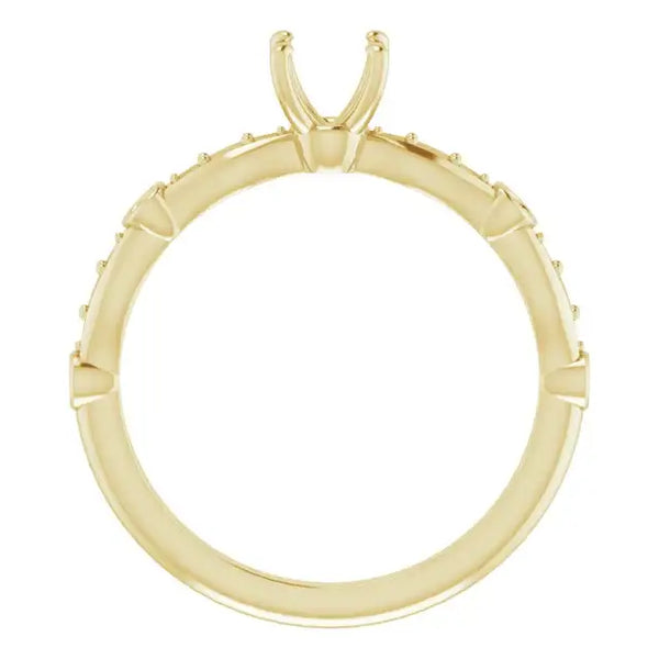Yellow gold solitaire engagement ring setting with square stone prongs and accent diamonds along the band.