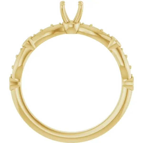 Yellow gold ring setting with open prong head for round stone and small accent diamonds along band.