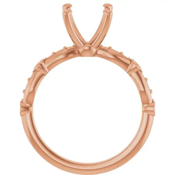 Rose gold engagement ring setting with oval stone opening and accent diamonds along the band.