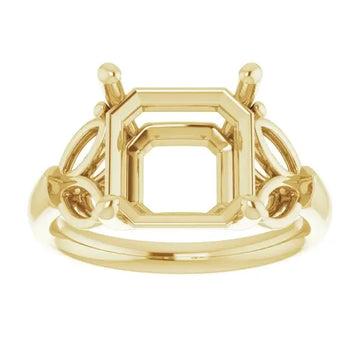 Yellow gold engagement ring setting with empty asscher-cut center stone and decorative side stones.