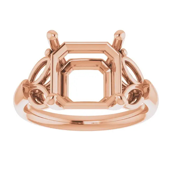 Rose gold engagement ring setting with octagonal center stone holder and decorative side accents.