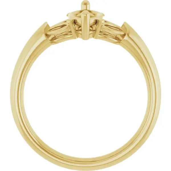 Yellow gold engagement ring setting with marquise stone holder and tapered baguette side accents.