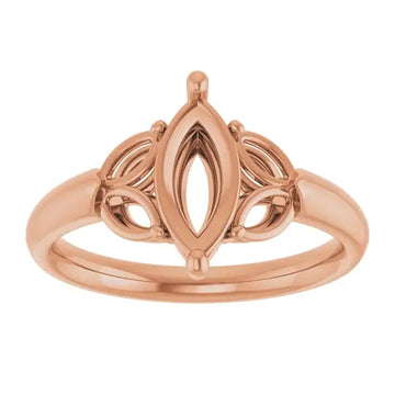Rose gold engagement ring setting with marquise-shaped center stone opening and decorative side details.