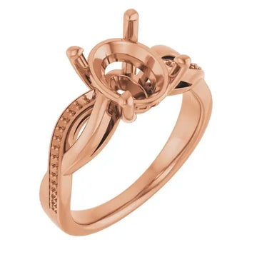 Rose gold engagement ring setting with oval stone holder and decorative side accents.