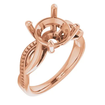 Rose gold engagement ring setting with round stone cup and ornamental side details.