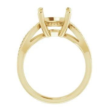 Yellow gold engagement ring setting with open four-prong head and textured band for round stones.