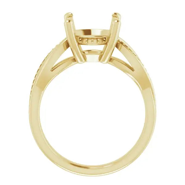 Yellow gold engagement ring setting with open four-prong head and textured band for round stones.