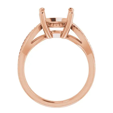Rose gold engagement ring setting with double prong head and textured band for round stones.