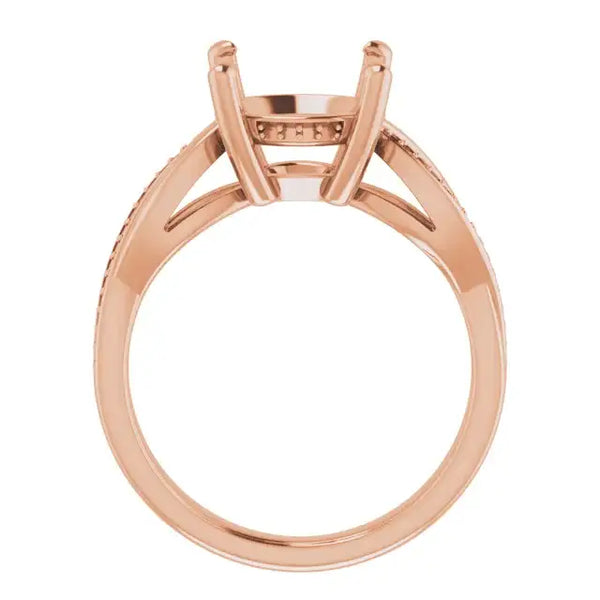 Rose gold engagement ring setting with double prong head and textured band for round stones.