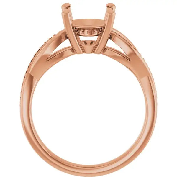 Rose gold engagement ring setting with oval stone holder and decorative side accents.