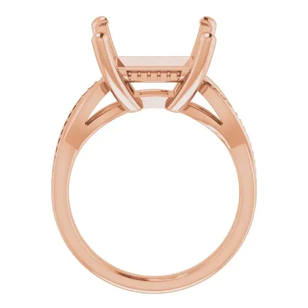 Rose gold engagement ring setting with square stone holder and textured band shown from above.