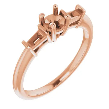 Rose gold engagement ring setting with geometric prongs sized for round stones.