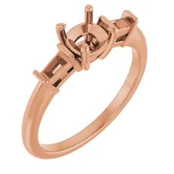Rose gold engagement ring setting with cushion stone center and side accents.