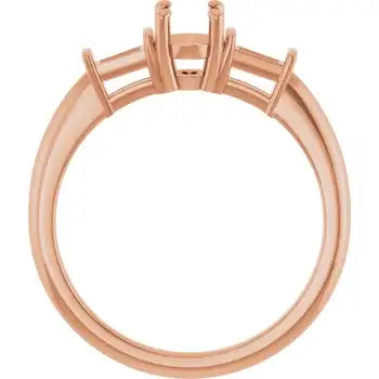 Rose gold engagement ring setting with oval stone prongs and polished band, shown from side view.