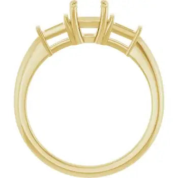Gold engagement ring setting with four prongs designed to hold a cushion-cut stone.