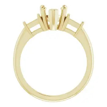 Gold engagement ring setting with six prongs designed for heart-shaped center stone and two smaller accent stones.