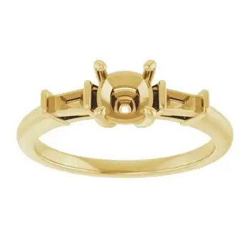 Gold engagement ring setting with cushion stone center and rectangular side stone accents.