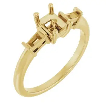 Gold-toned ring setting with three empty rectangular prongs for emerald-cut stones on a polished band.