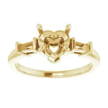 Yellow gold engagement ring setting with heart-shaped center stone and rectangular side stones.