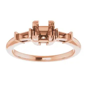Rose gold engagement ring setting with square stone center and geometric side stone accents.