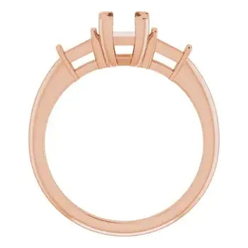Rose gold engagement ring setting with four vertical prongs designed to hold a square stone.
